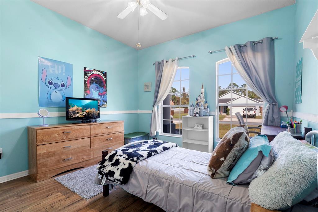 6480 Fall Street St. Cloud, FL 34771 - Photo 27 of 47 a bedroom with furniture and a window