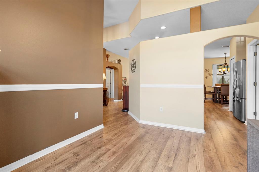 6480 Fall Street St. Cloud, FL 34771 - Photo 36 of 47 a view of a livingroom with wooden floor