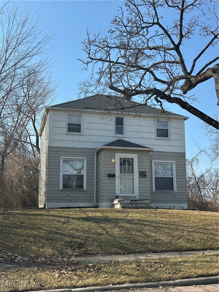 17116 Ridgeton Drive Cleveland, OH 44128 - Photo 1 of 2 View of front facade with a front yard