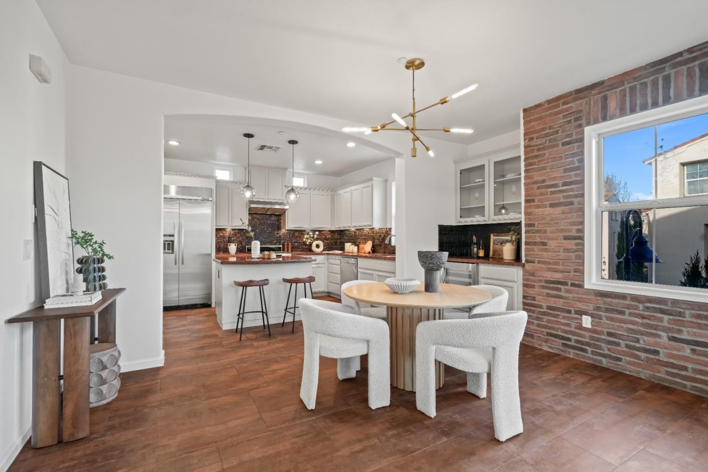 451 Chagall Street Mountain View, CA 94041 - Photo 11 of 58 a large kitchen with a table and chairs