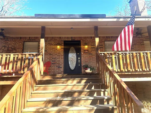a view of balcony with two chairs