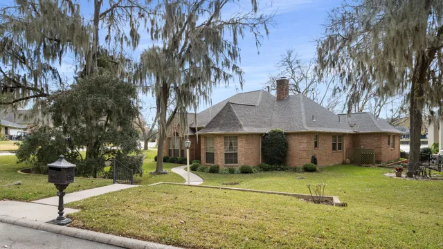 a house with trees in front of it