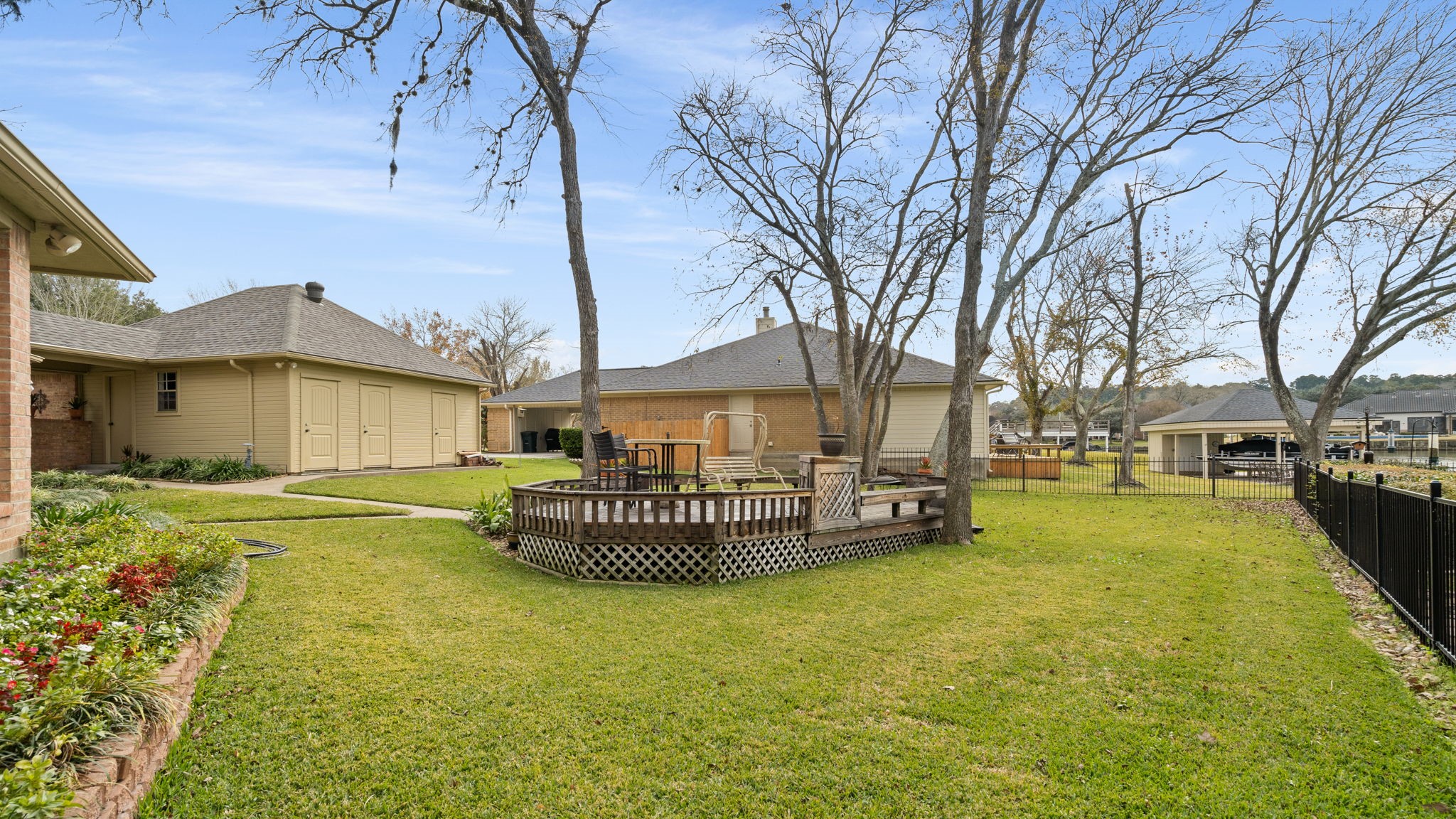 100 April Breeze Conroe, TX 77356 - Photo 31 of 40 Large deck to enjoy the views and notice the 3 storage rooms on the back of the garage