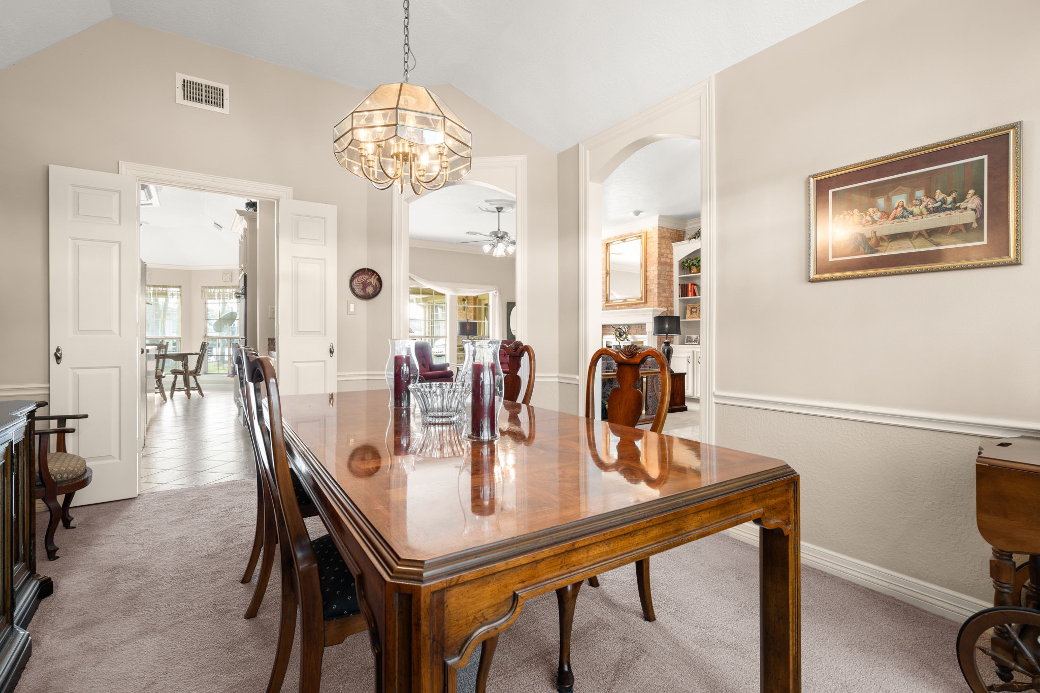 100 April Breeze Conroe, TX 77356 - Photo 8 of 40 View of formal dining room with entry into the kitchen and living room.