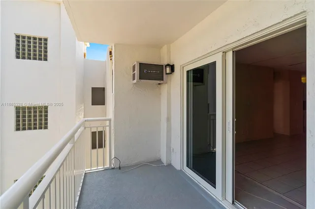 a view of a balcony with an ocean view