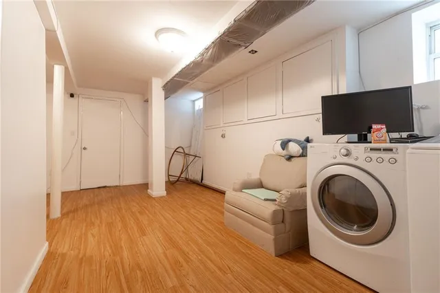 a bedroom with furniture and a fireplace