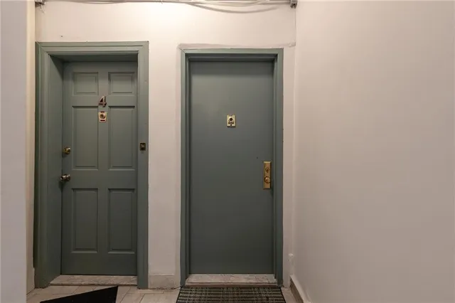 a view of livingroom with furniture and workspace