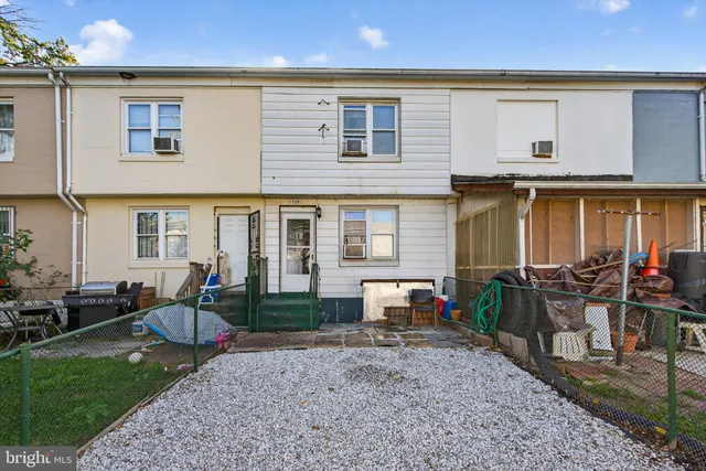 a front view of a house with patio
