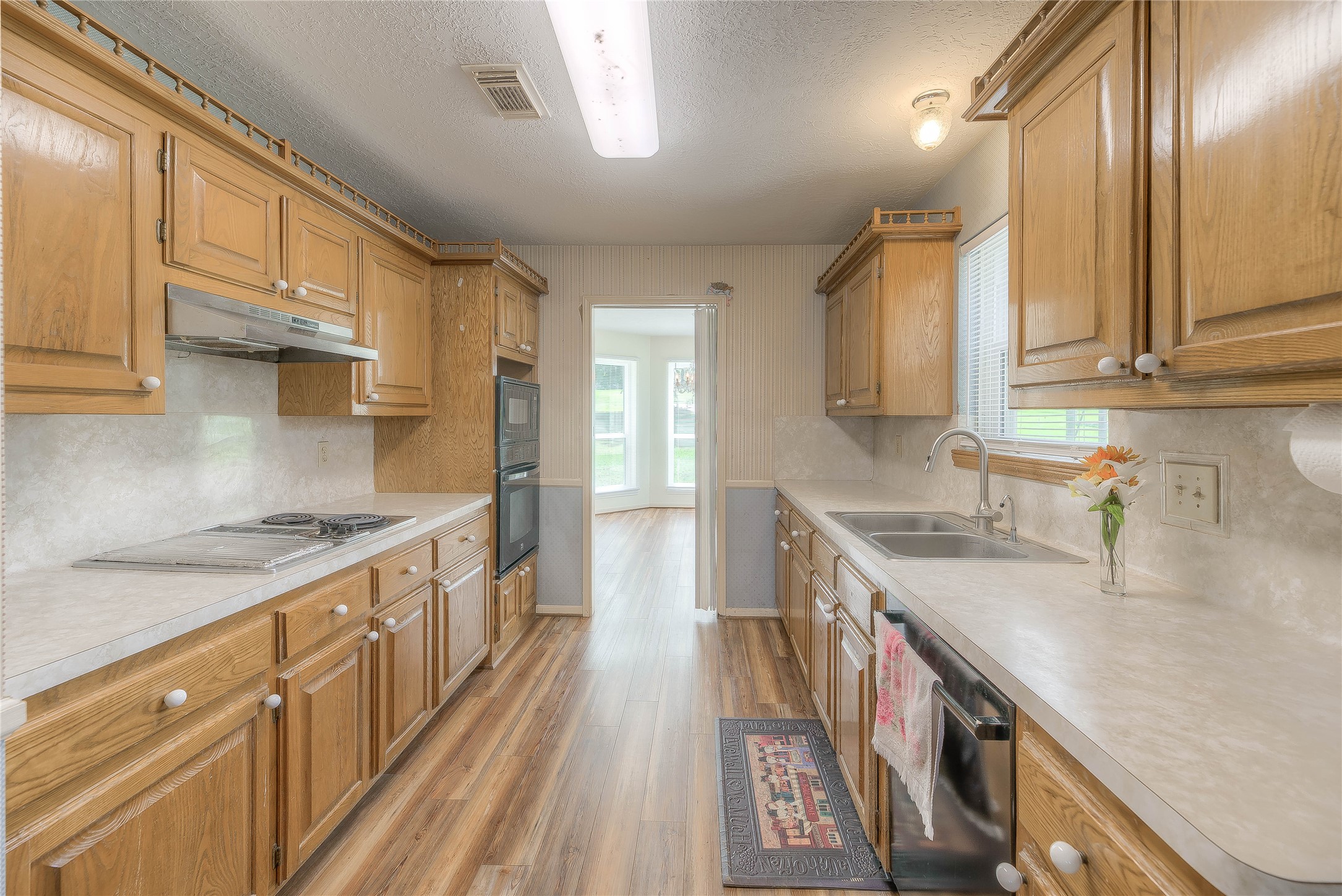 440 Lakeview Dr Loop Coldspring, TX 77331 - Photo 18 of 44 ANOTHER VIEW OF KITCHEN AND FORMAL DINING