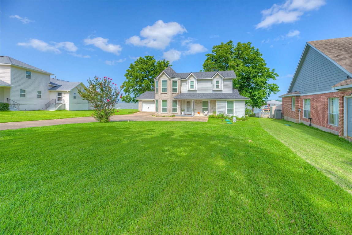 440 Lakeview Dr Loop Coldspring, TX 77331 - Photo 34 of 44 a view of a house with a big yard