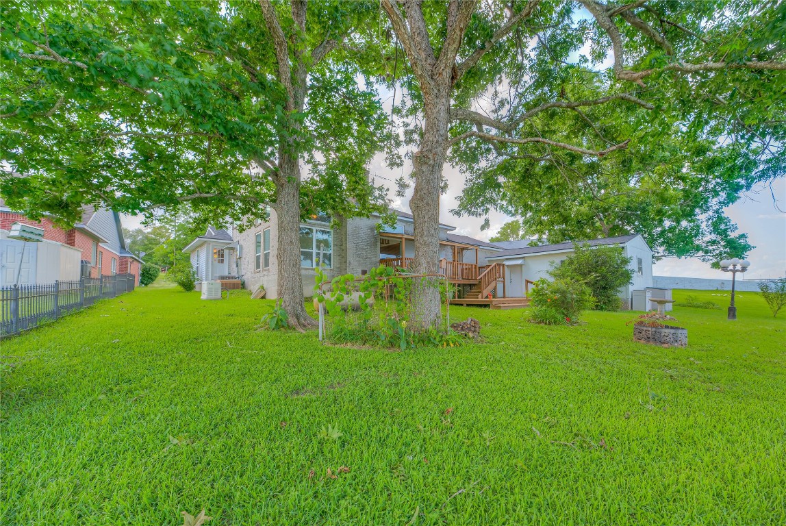 440 Lakeview Dr Loop Coldspring, TX 77331 - Photo 38 of 44 a view of a house with a yard