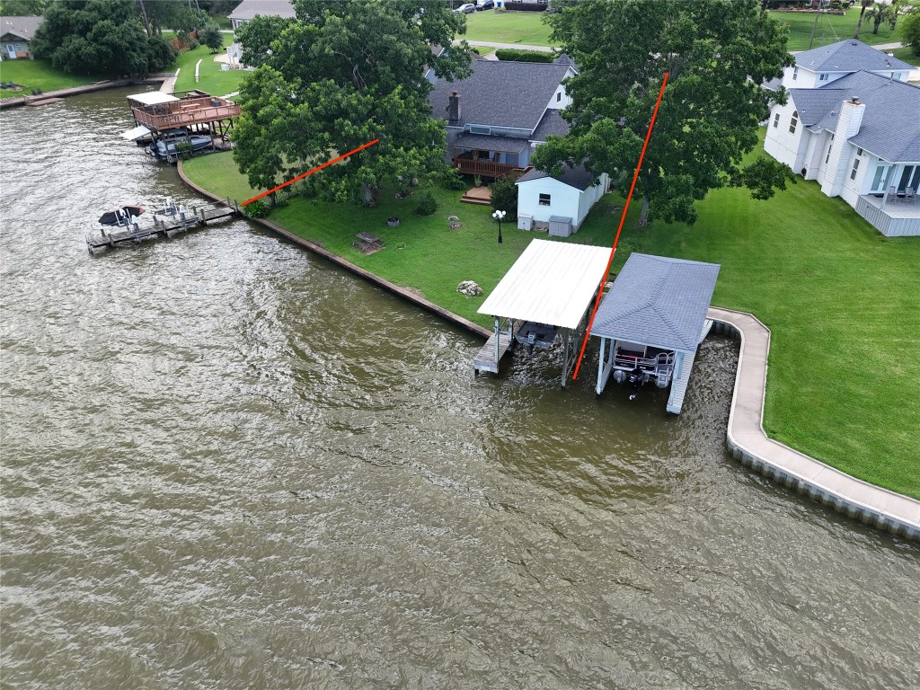 440 Lakeview Dr Loop Coldspring, TX 77331 - Photo 44 of 44 an aerial view of a house with garden space and street view