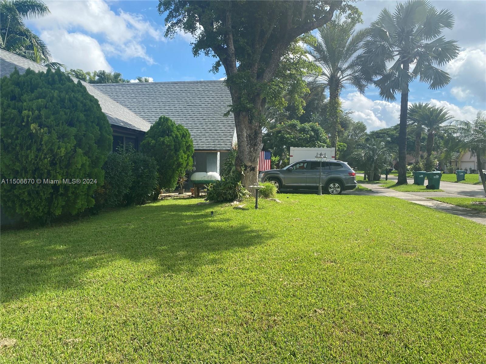 13341 Southwest 101st Street Miami, FL 33186 - Photo 11 of 43 a view of a park with large trees