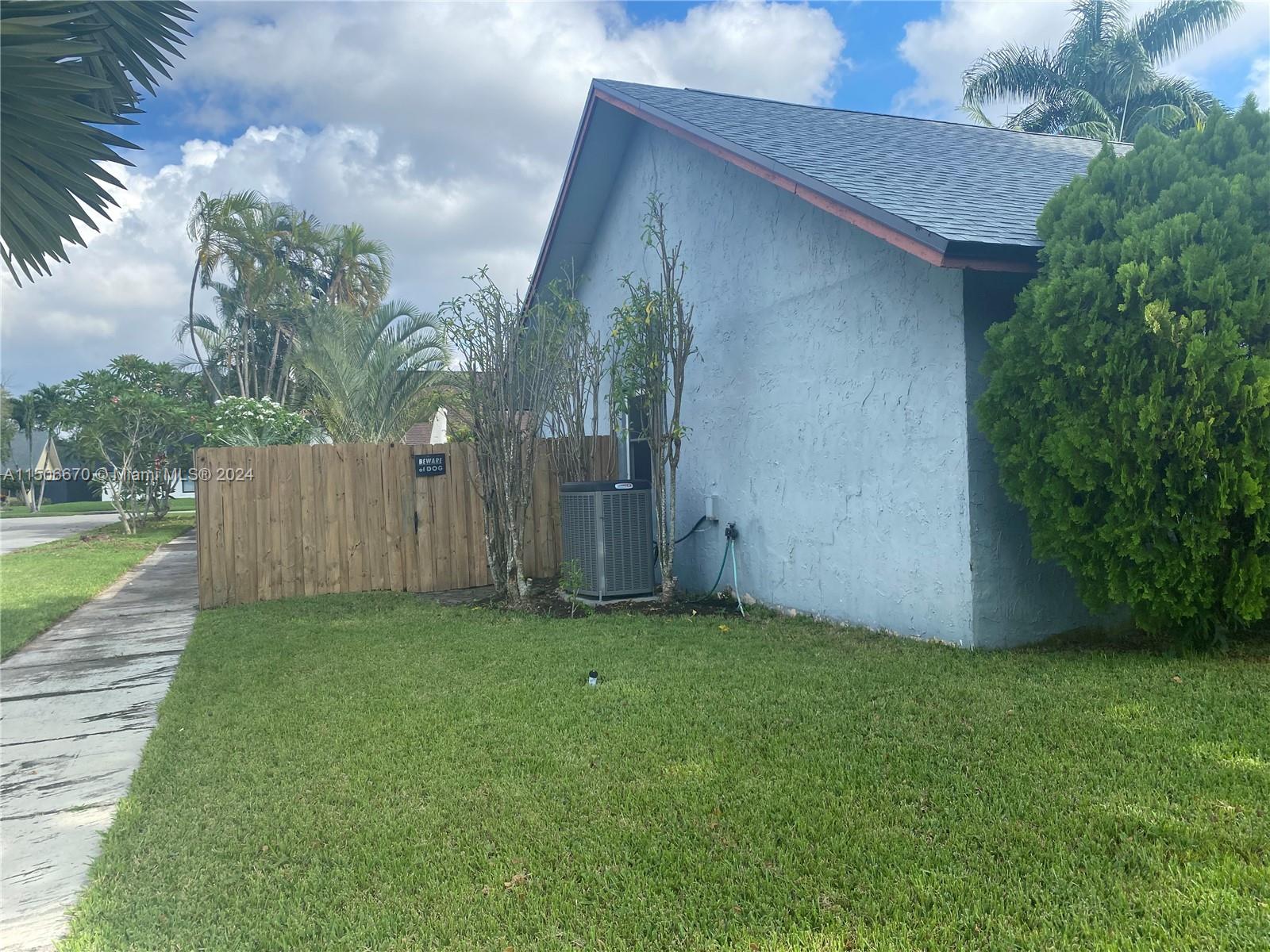 13341 Southwest 101st Street Miami, FL 33186 - Photo 12 of 43 a view of a back yard of the house