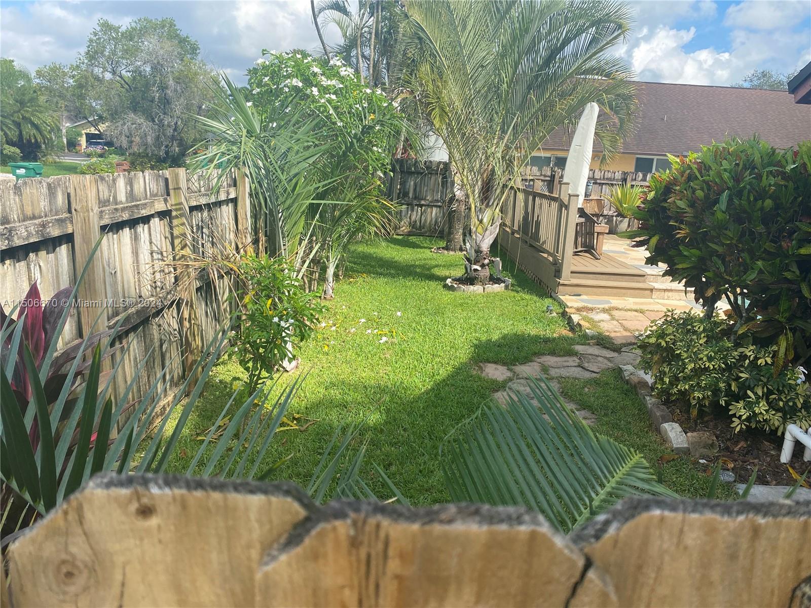13341 Southwest 101st Street Miami, FL 33186 - Photo 19 of 43 a view of outdoor space and garden