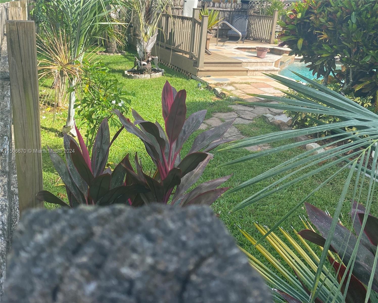 13341 Southwest 101st Street Miami, FL 33186 - Photo 20 of 43 a view of a garden