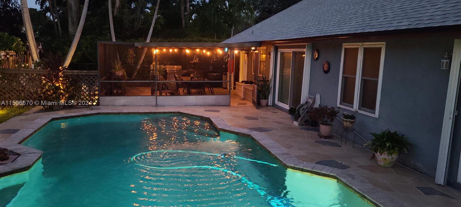 13341 Southwest 101st Street Miami, FL 33186 - Photo 2 of 43 swimming pool view with a garden space