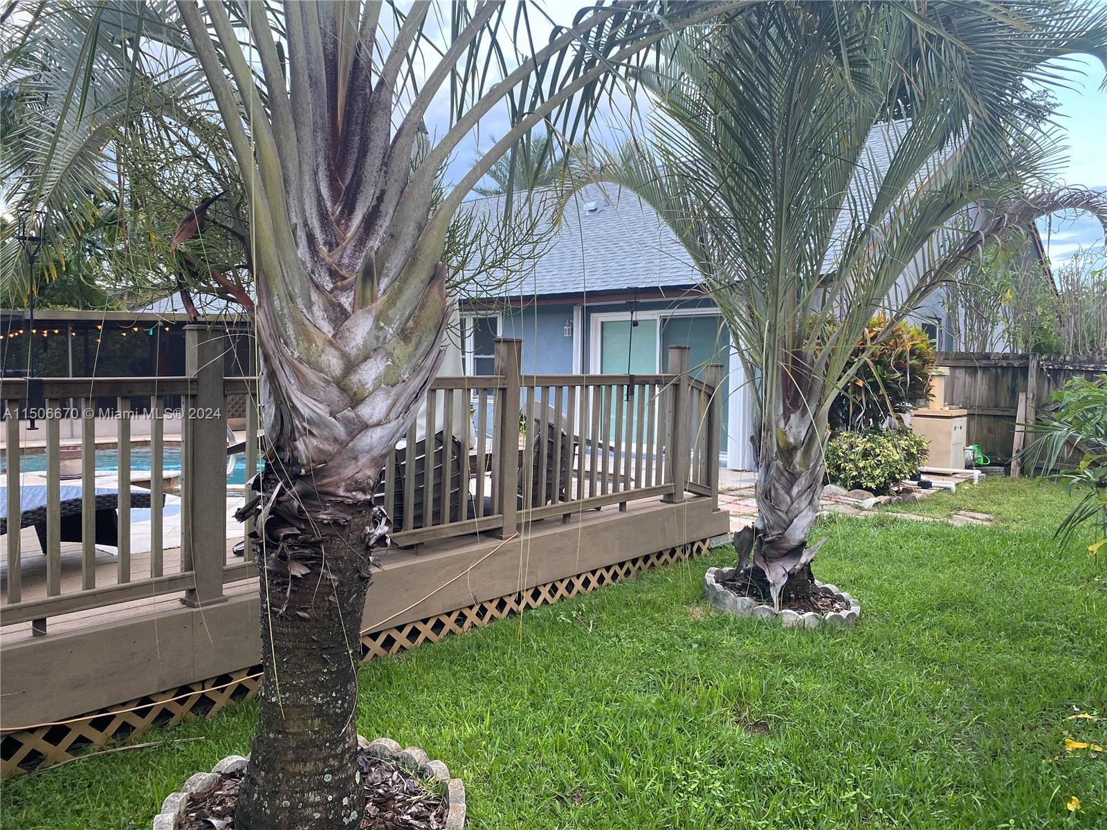 13341 Southwest 101st Street Miami, FL 33186 - Photo 21 of 43 a front view of a house with garden