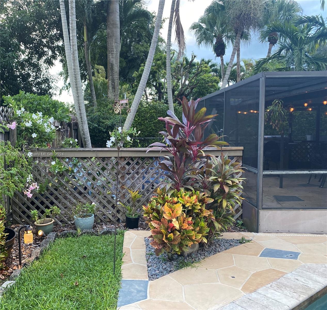13341 Southwest 101st Street Miami, FL 33186 - Photo 22 of 43 a view of a backyard with plants