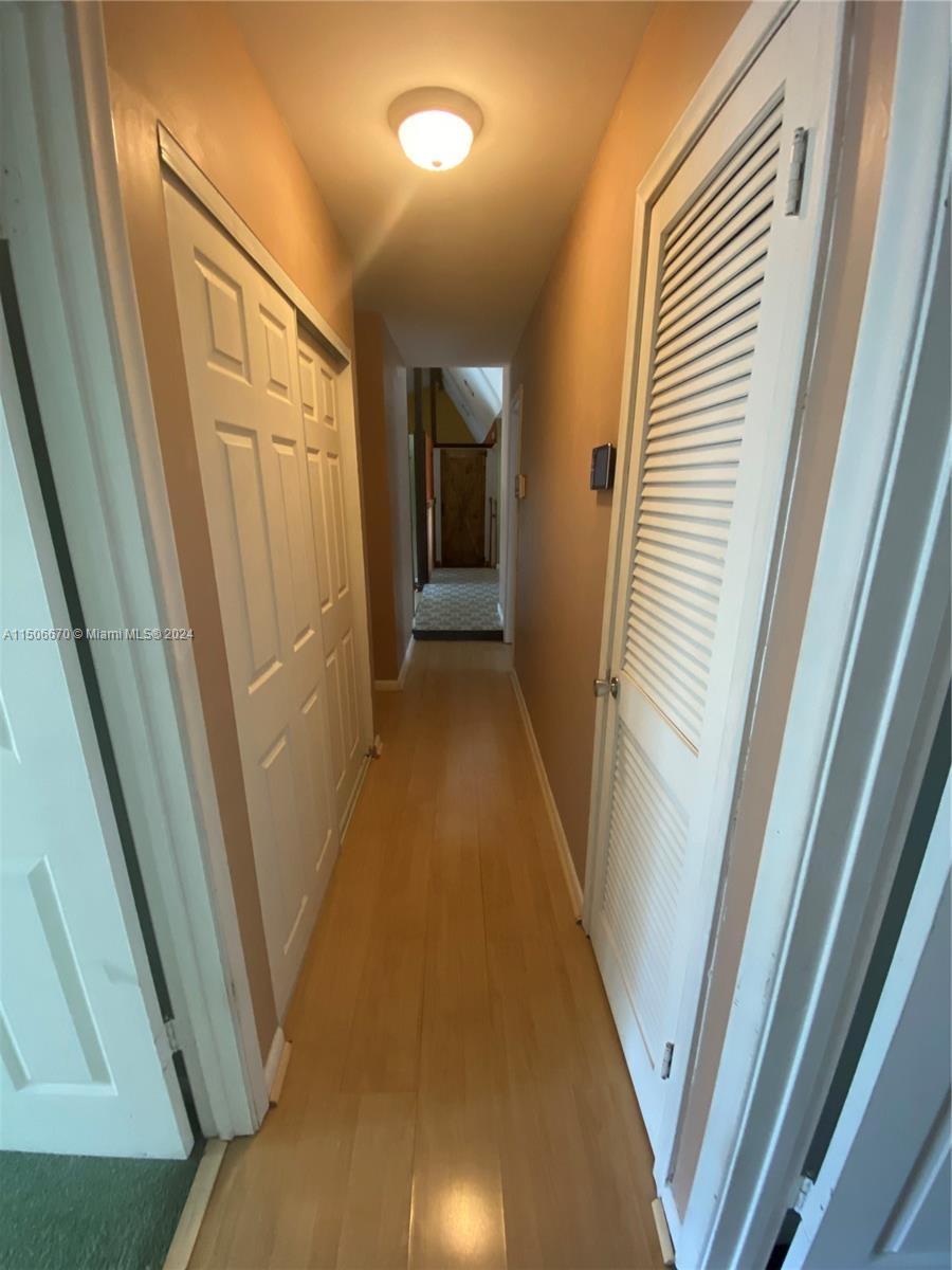 13341 Southwest 101st Street Miami, FL 33186 - Photo 31 of 43 a view of a hallway