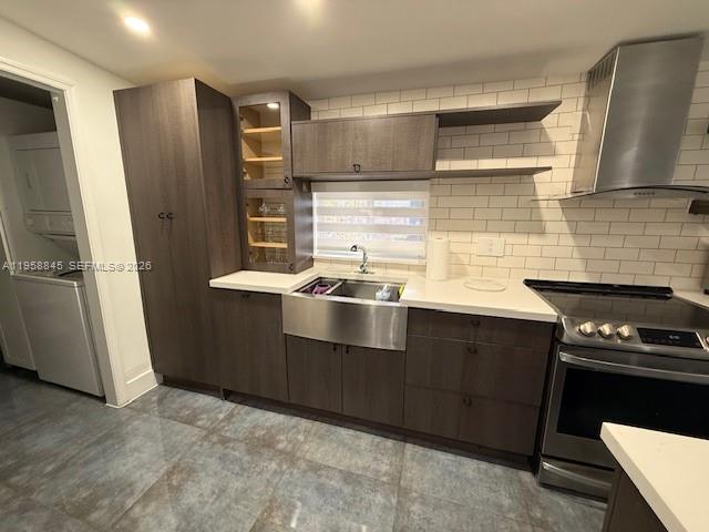3008 Northwest 13th Street Miami, FL 33125 - Photo 25 of 32 a kitchen with stainless steel appliances a refrigerator and a stove