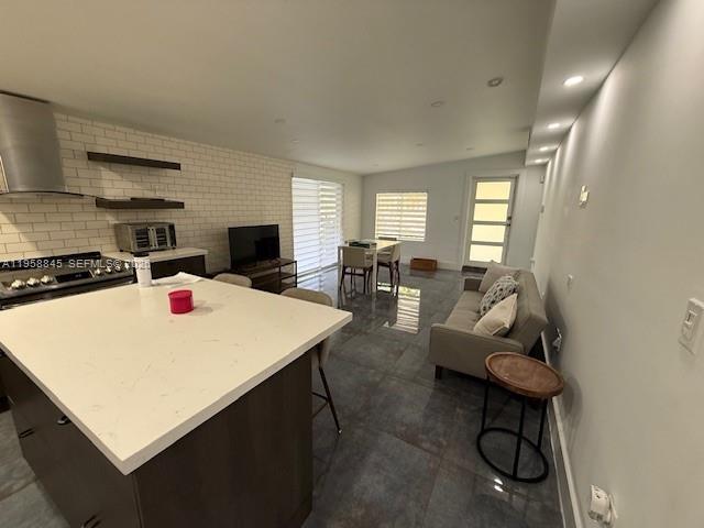 3008 Northwest 13th Street Miami, FL 33125 - Photo 26 of 32 a living room with furniture and a table