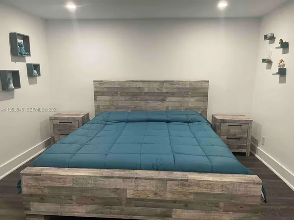 a living room with a bed