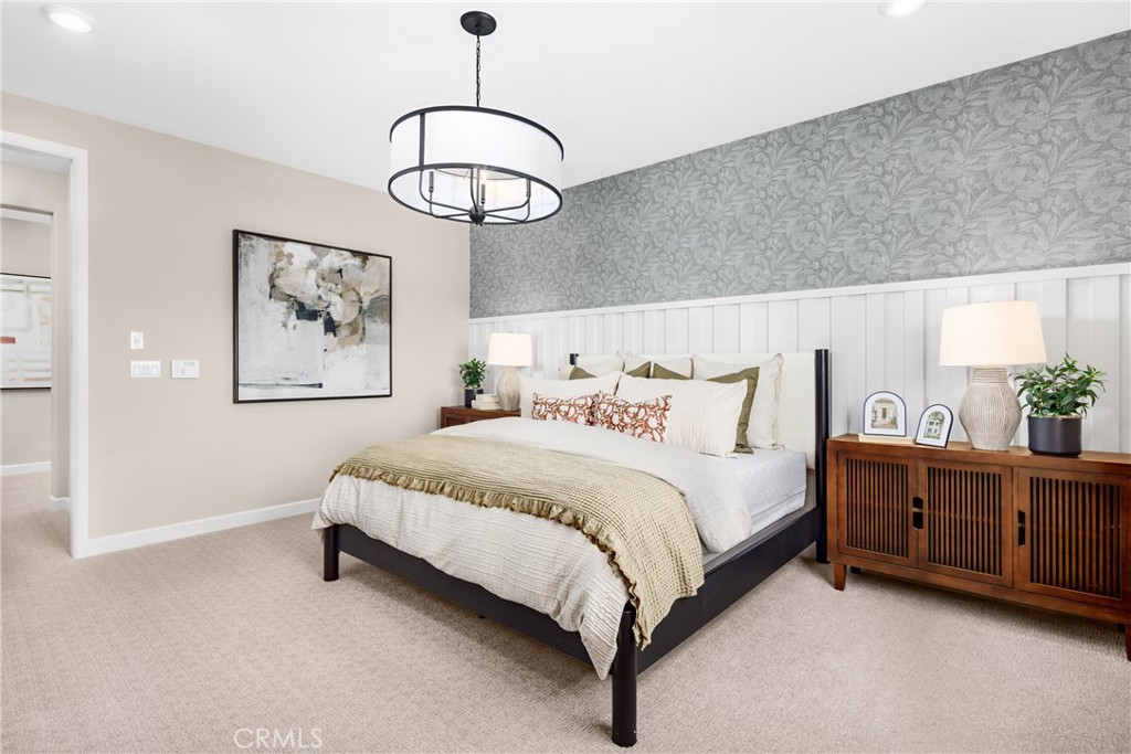 2025 Simpatico Place Escondido, CA 92026 - Photo 11 of 15 a spacious bedroom with a bed and cabinets