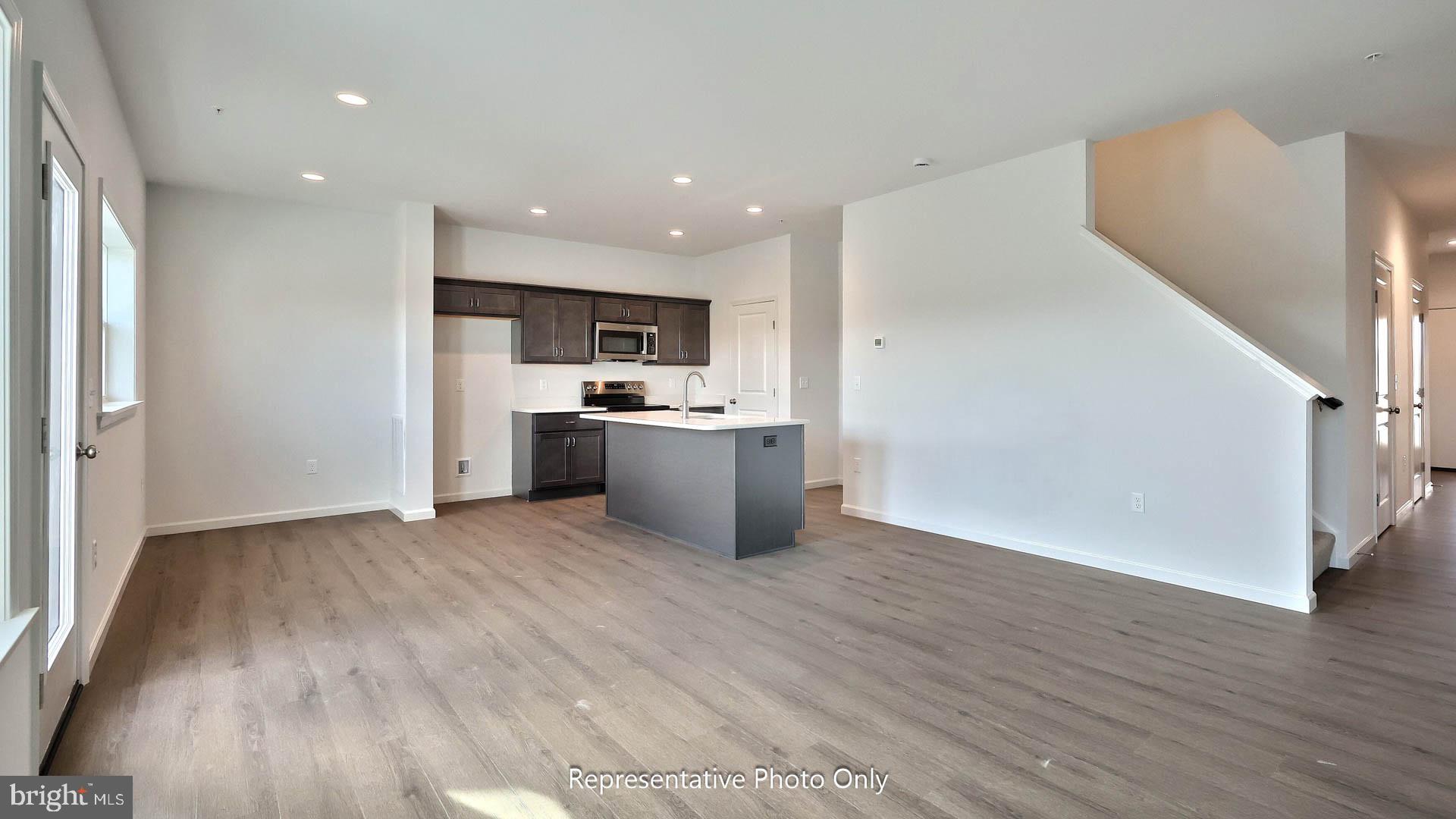 140 Foundry Lane Lebanon, PA 17042 - Photo 7 of 18 a view of kitchen with wooden floor and electronic appliances