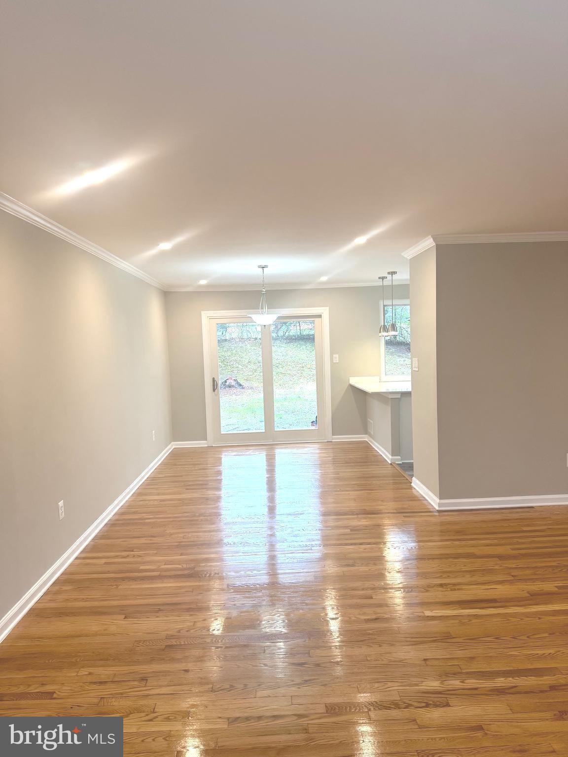 9610 McAlpine Road Silver Spring, MD 20901 - Photo 8 of 44 dining with sliding door leading to patio
