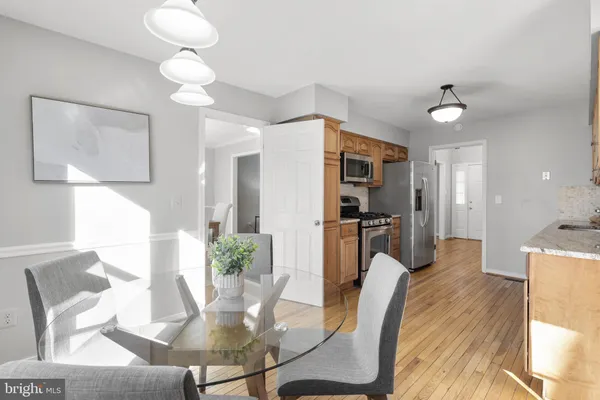 a view of a dining room with furniture