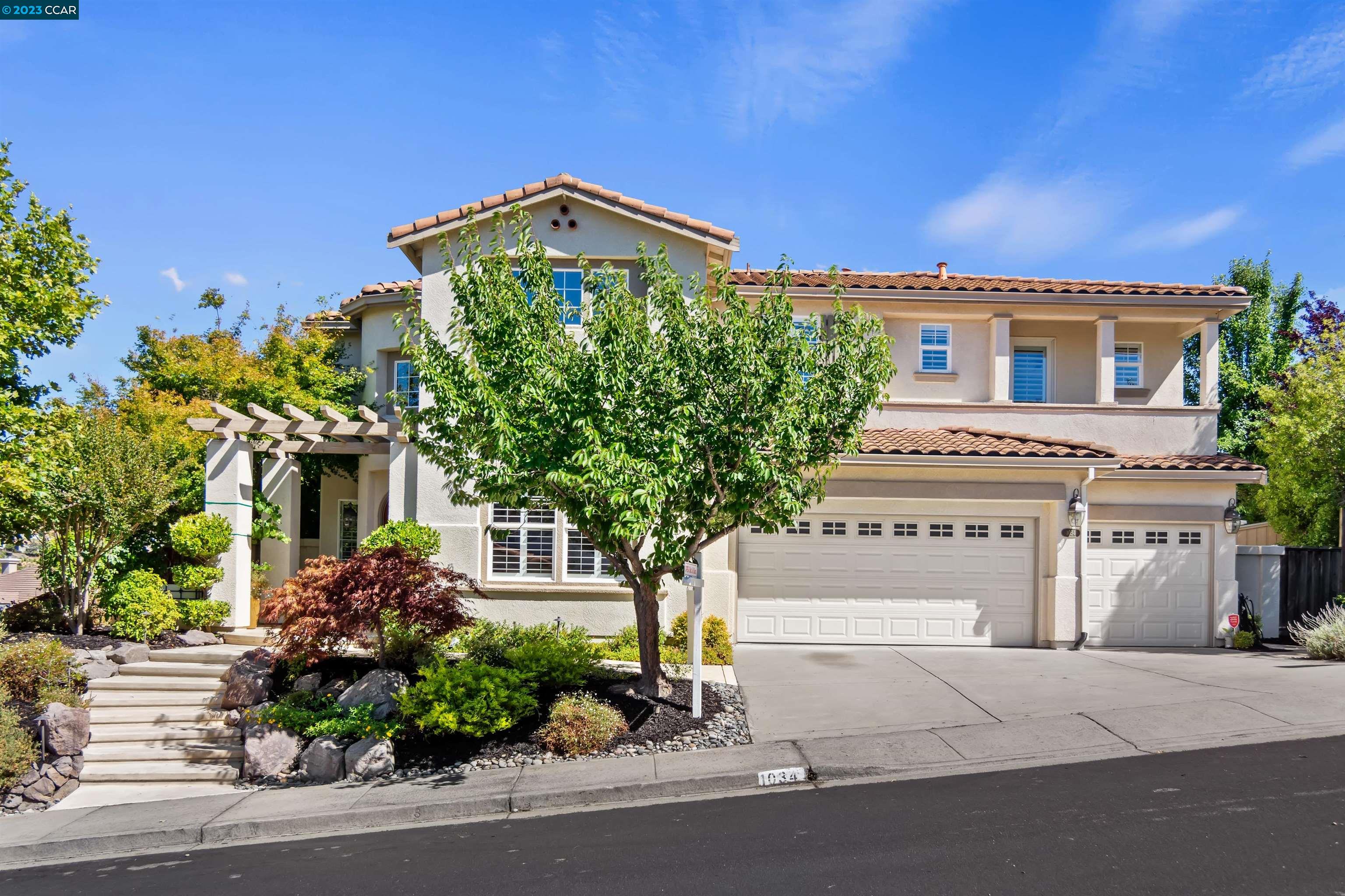 1034 Laurel Tree Drive Concord, CA 94521 - Photo 1 of 1 front view of a house with a street
