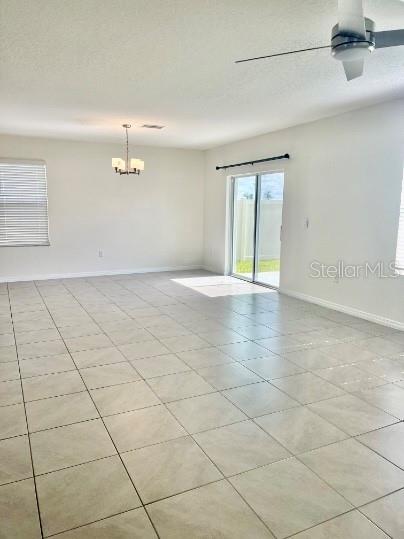 31284 Penny Surf Loop Wesley Chapel, FL 33545 - Photo 3 of 15 a view of an empty room with a window