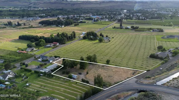 a view of a lake with a yard