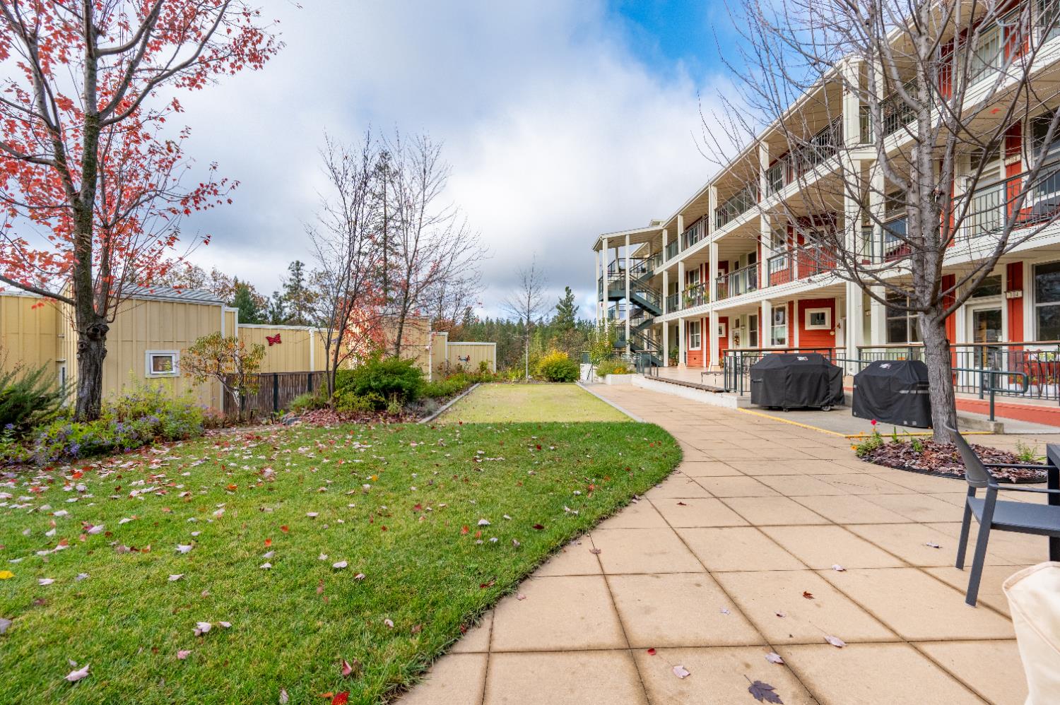 800 Freeman Lane, Unit 207 Grass Valley, CA 95949 - Photo 17 of 29 a view of a building with a yard