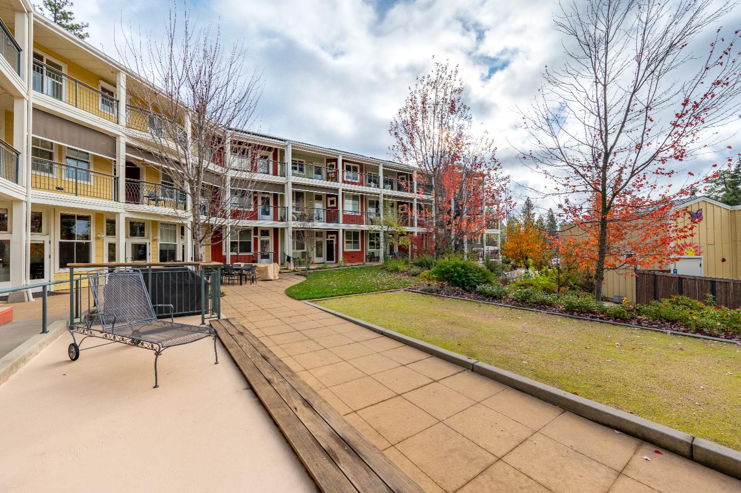 800 Freeman Lane, Unit 207 Grass Valley, CA 95949 - Photo 19 of 29 a view of a building with a bench