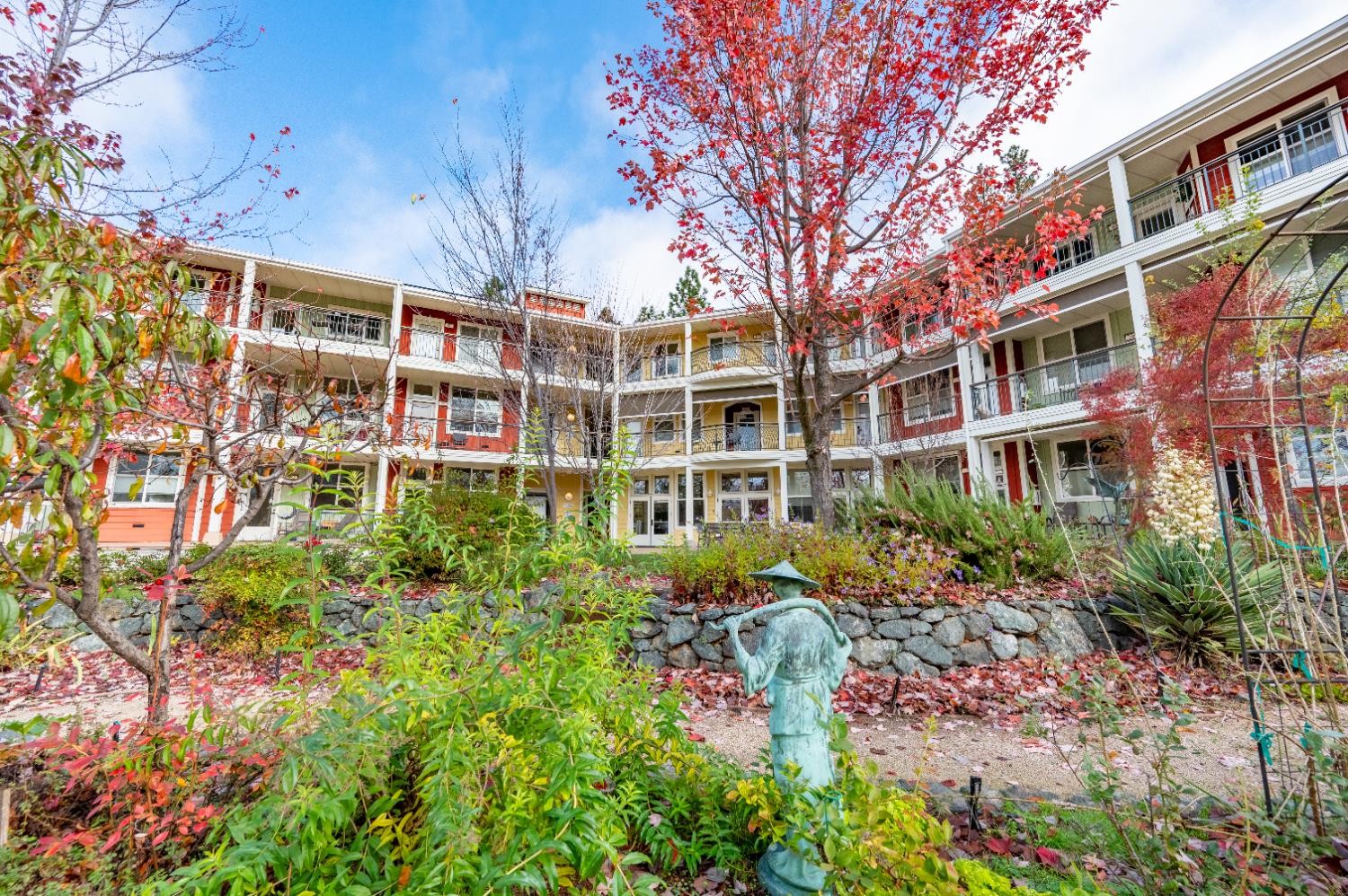 800 Freeman Lane, Unit 207 Grass Valley, CA 95949 - Photo 21 of 29 a view of a building with a garden