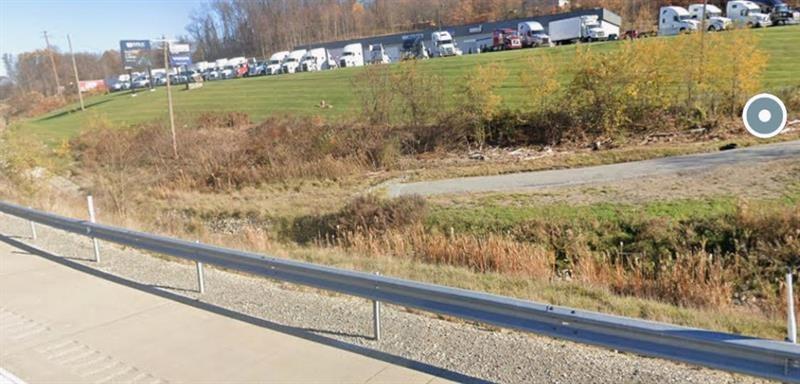 a view of a lake from a balcony