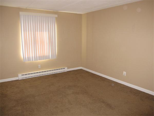 46 Cochituate Road, Unit 203 Framingham, MA 01701 - Photo 4 of 5 an empty room with a window