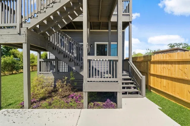 a view of balcony with furniture