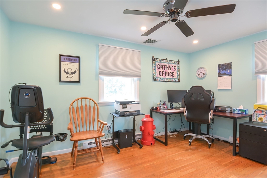 123 Capper Drive Canton, MA 02021 - Photo 14 of 32 a view of a workspace with furniture and a window