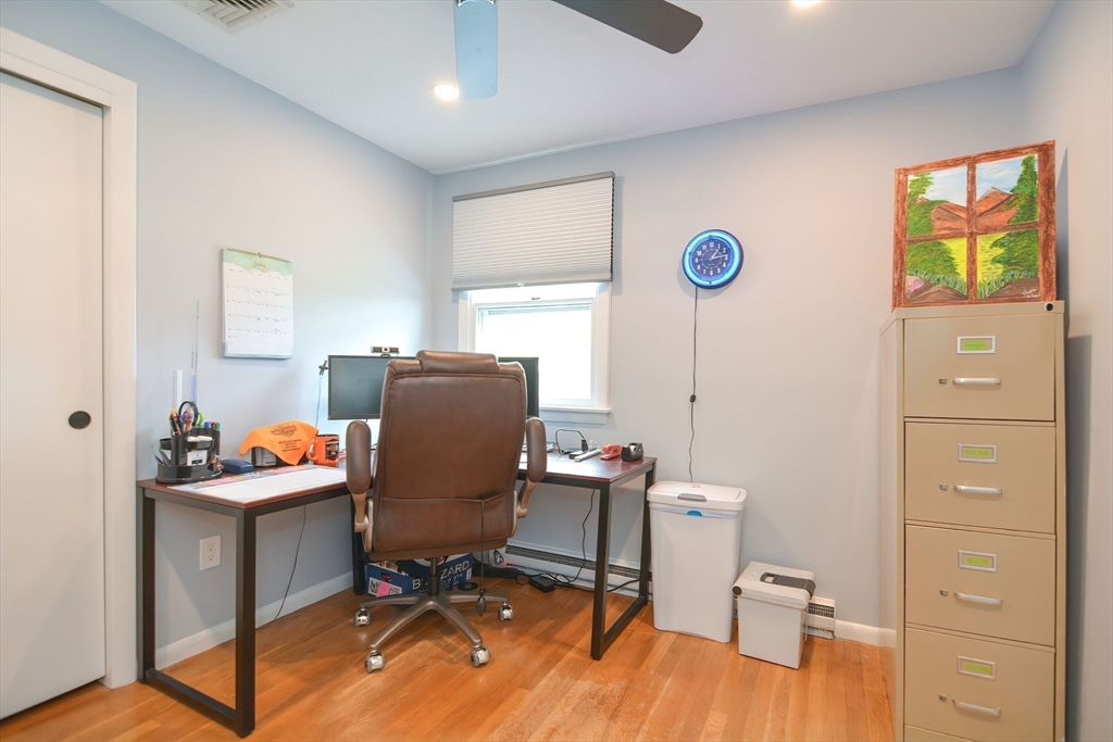 123 Capper Drive Canton, MA 02021 - Photo 15 of 32 a view of a workspace with furniture and a window