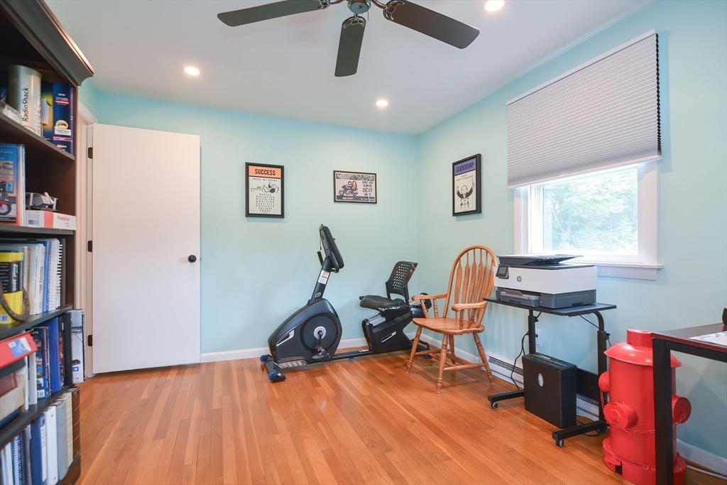 123 Capper Drive Canton, MA 02021 - Photo 17 of 32 a view of a workspace with furniture and a window