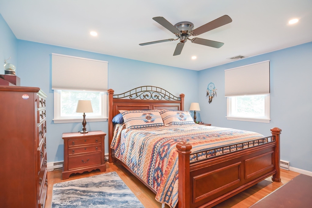 123 Capper Drive Canton, MA 02021 - Photo 7 of 32 a bedroom with a bed and window