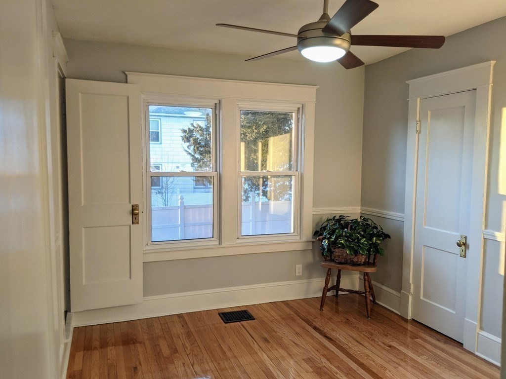 37 Montcalm Street Springfield, MA 01151 - Photo 18 of 33 a view of a room that has a window and wooden floor