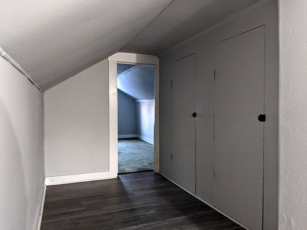 37 Montcalm Street Springfield, MA 01151 - Photo 24 of 33 a view of an empty room with wooden floor