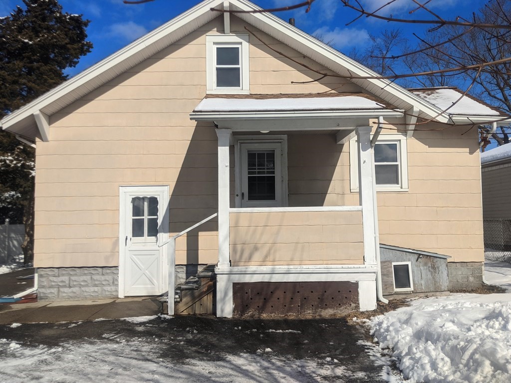 37 Montcalm Street Springfield, MA 01151 - Photo 4 of 33 a view of a white house with a yard