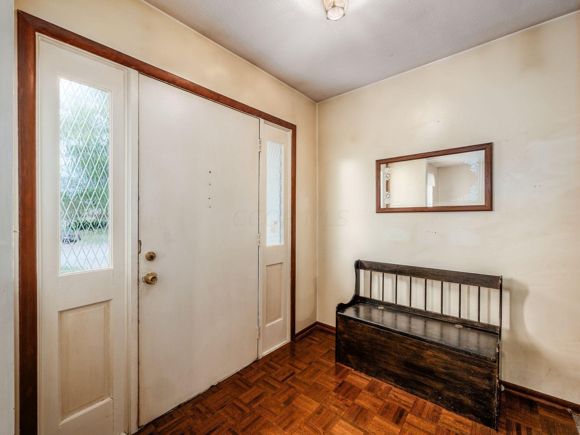 1891 Fairhaven Road Columbus, OH 43229 - Photo 3 of 36 Large entry with parquet flooring and large coat closet.