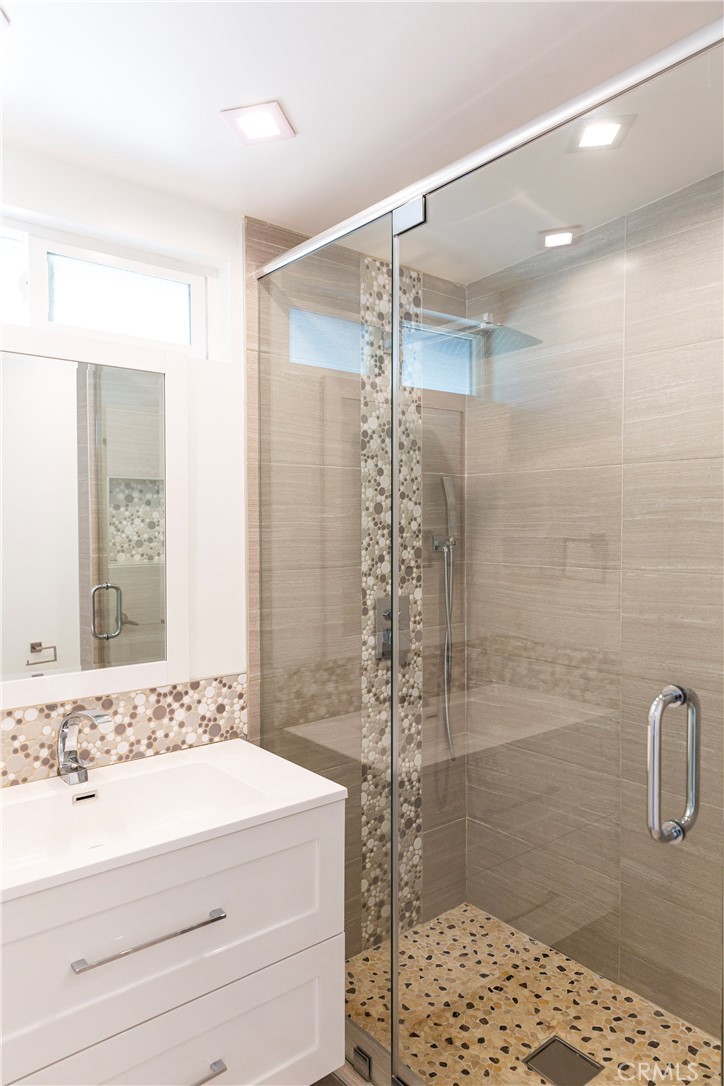 3155 Brookhill Street La Crescenta, CA 91214 - Photo 11 of 28 a bathroom with a sink and a mirror