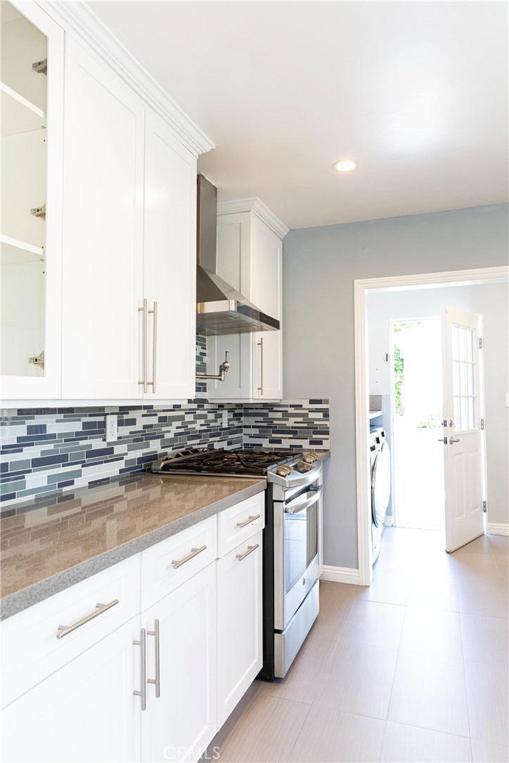 3155 Brookhill Street La Crescenta, CA 91214 - Photo 14 of 28 a kitchen with stainless steel appliances granite countertop a stove and a sink